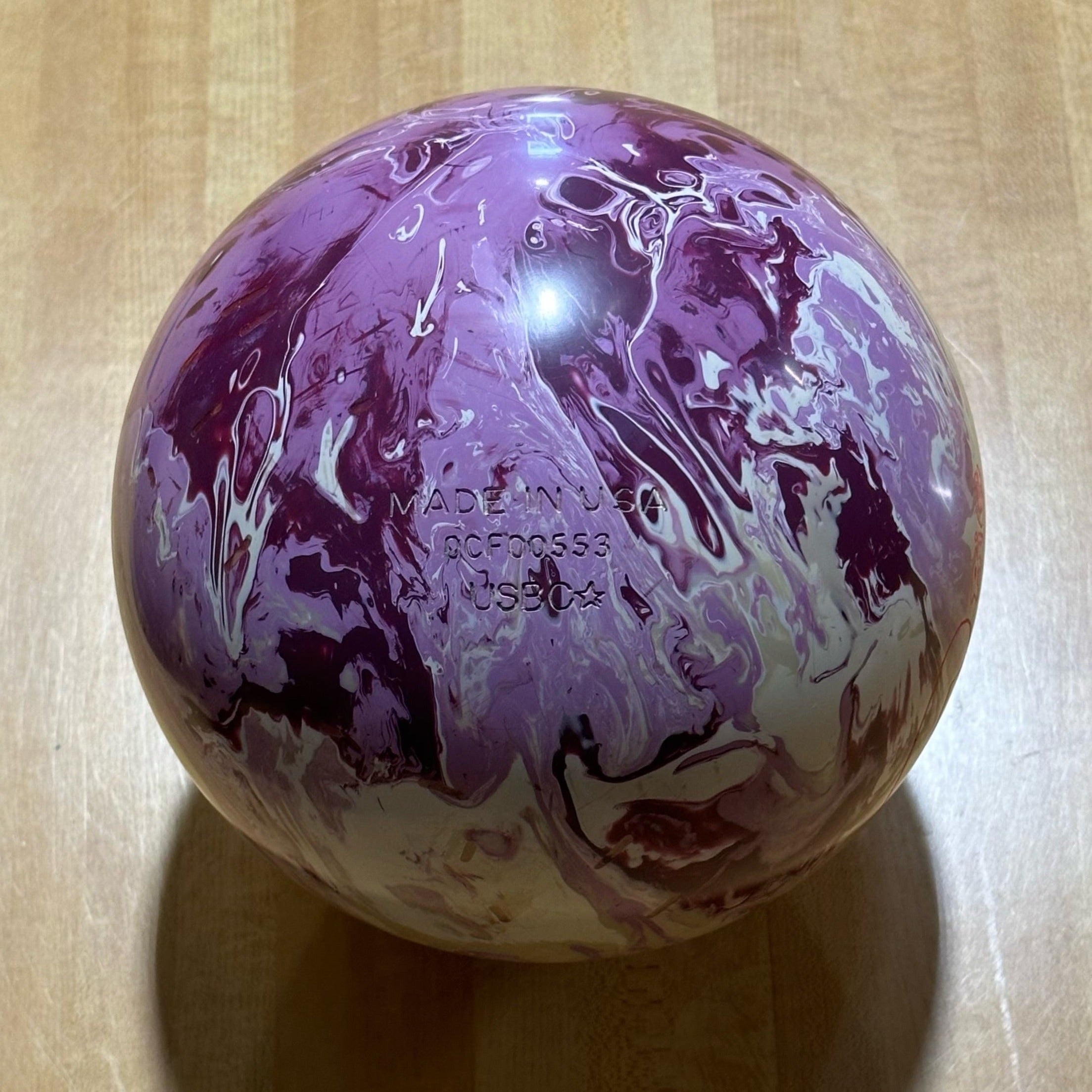 how to curve bowling ball